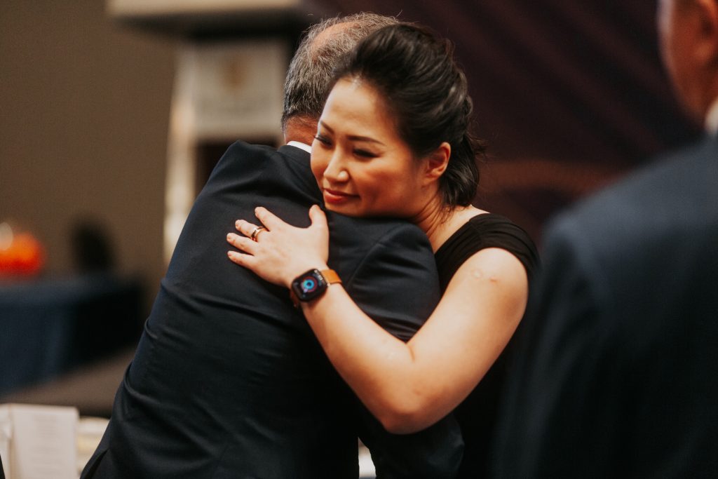 IPPFA Midnight Award 2023 Two People Hugging On The Event